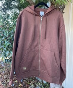 Divine Tribe Hemp Zip Up Hoodie on hanger